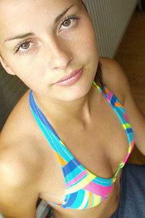Coed girl taking off her sexy bikini-00